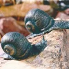 2 Schnecken-Skulpturen im Set aus Bronze